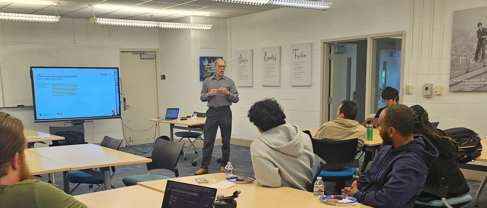 Dr. Franz Klein leading a quantum computing workshop at UDC.