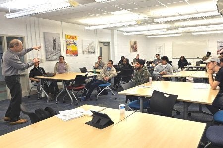 Dr. Franz Klein leading quantum computing workshop at UDC